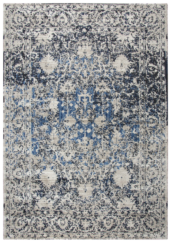 Using antique Persian carpets as an inspiration, the artist has updated  this design through the clever use of scale and faux wear pattrns. By using a wide variety of shades in today’s hottest colors, the Blues, Grays and Cream accents make this rug  on point for today’s hot trends. Power loomed in India using an exclusive new yarn called