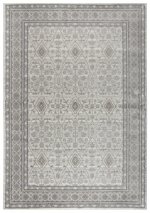 Using antique Persian carpets as an inspiration, the artist has updated  this design through the clever use of scale and faux wear pattrns. By using subtle shading of  colors, the Taups, Grays and Cream accents, this rug is very versatile and right   on point for today’s decor. Power loomed in India using an exclusive new yarn called" ZIRLON"  which has  the rich look and soft feel of wool, with the cleanability and affordability of traditional synthetic fibers.