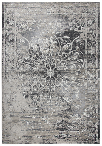 Using antique Persian carpets as an inspiration, the artist has updated  this design through the clever use of scale and faux wear pattrns. By using a wide variety of shades in today’s hottest colors, the Blues, Grays and Cream accents make this rug  on point for today’s hot trends. Power loomed in India using an exclusive new yarn called" ZIRLON"  which has  the rich look and soft feel of wool, with the cleanability and affordability of traditional synthetic fibers.